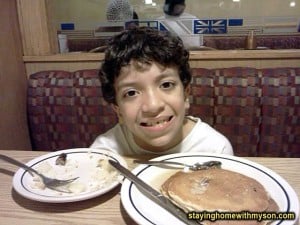 Andrew enjoying his free pancakes